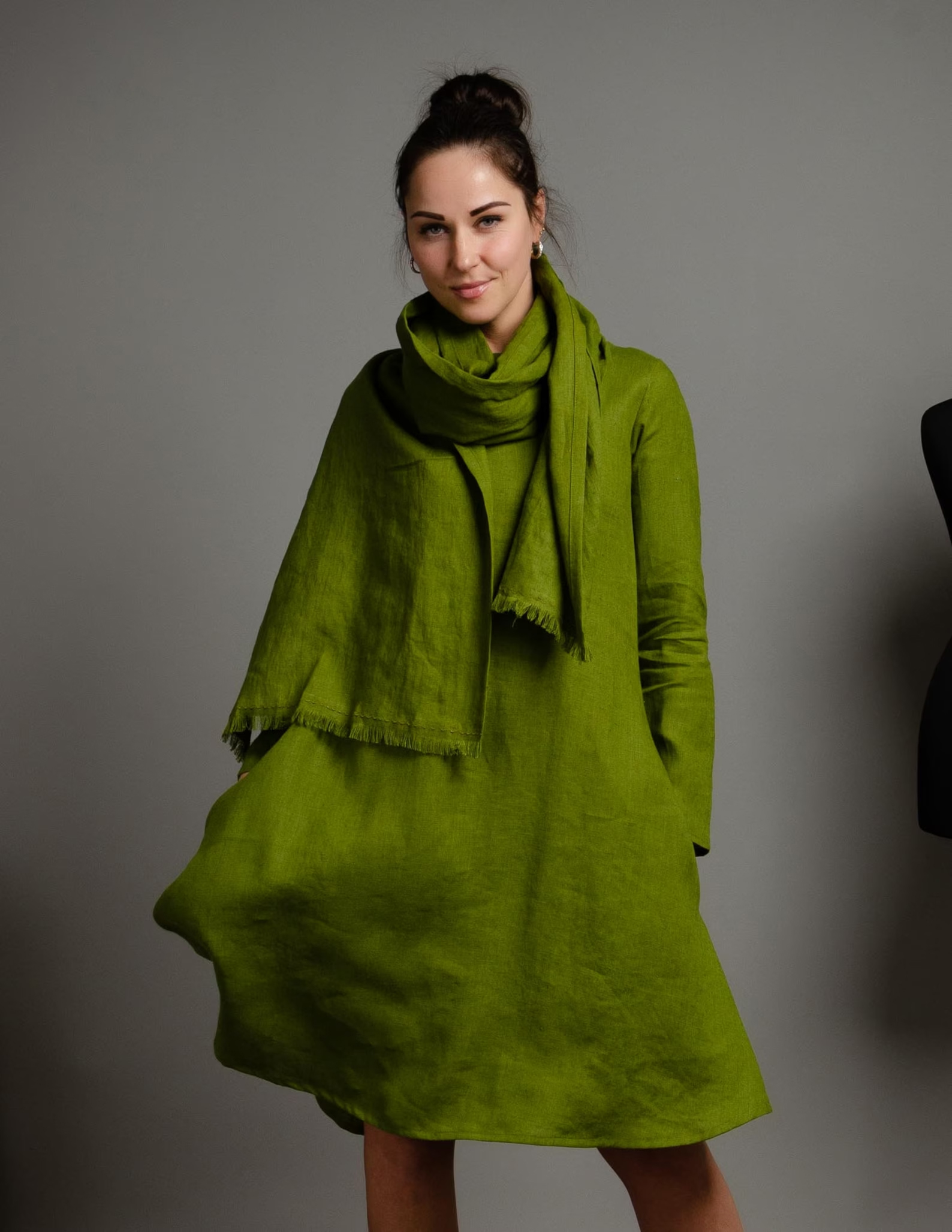 A model wearing an Etsy sustainable scarf.