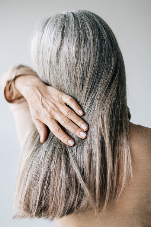 How Premature Gray Hair Is Teaching Me To Age Well - The Good Trade