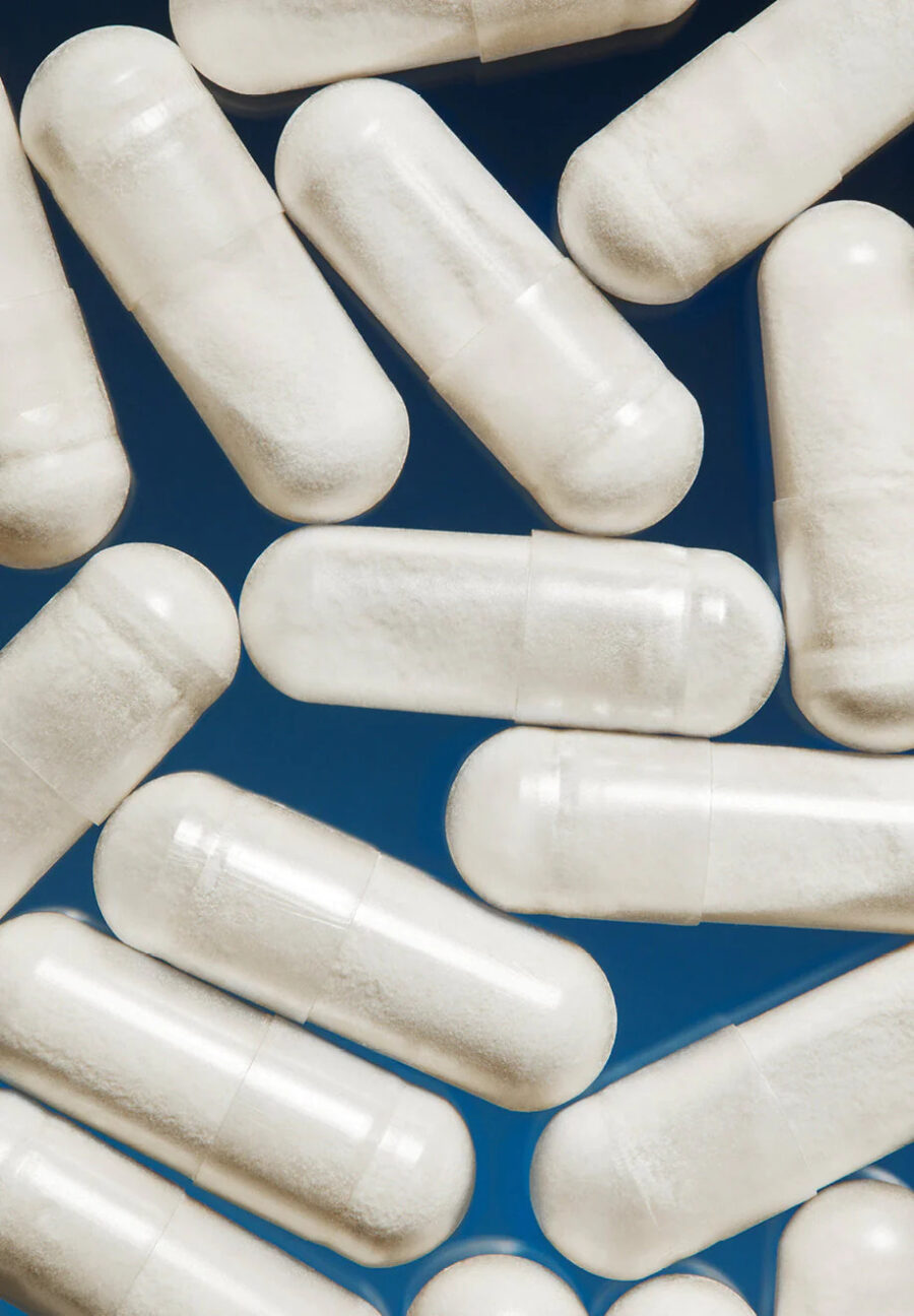 A close up of The Nue Co. probiotic capsules