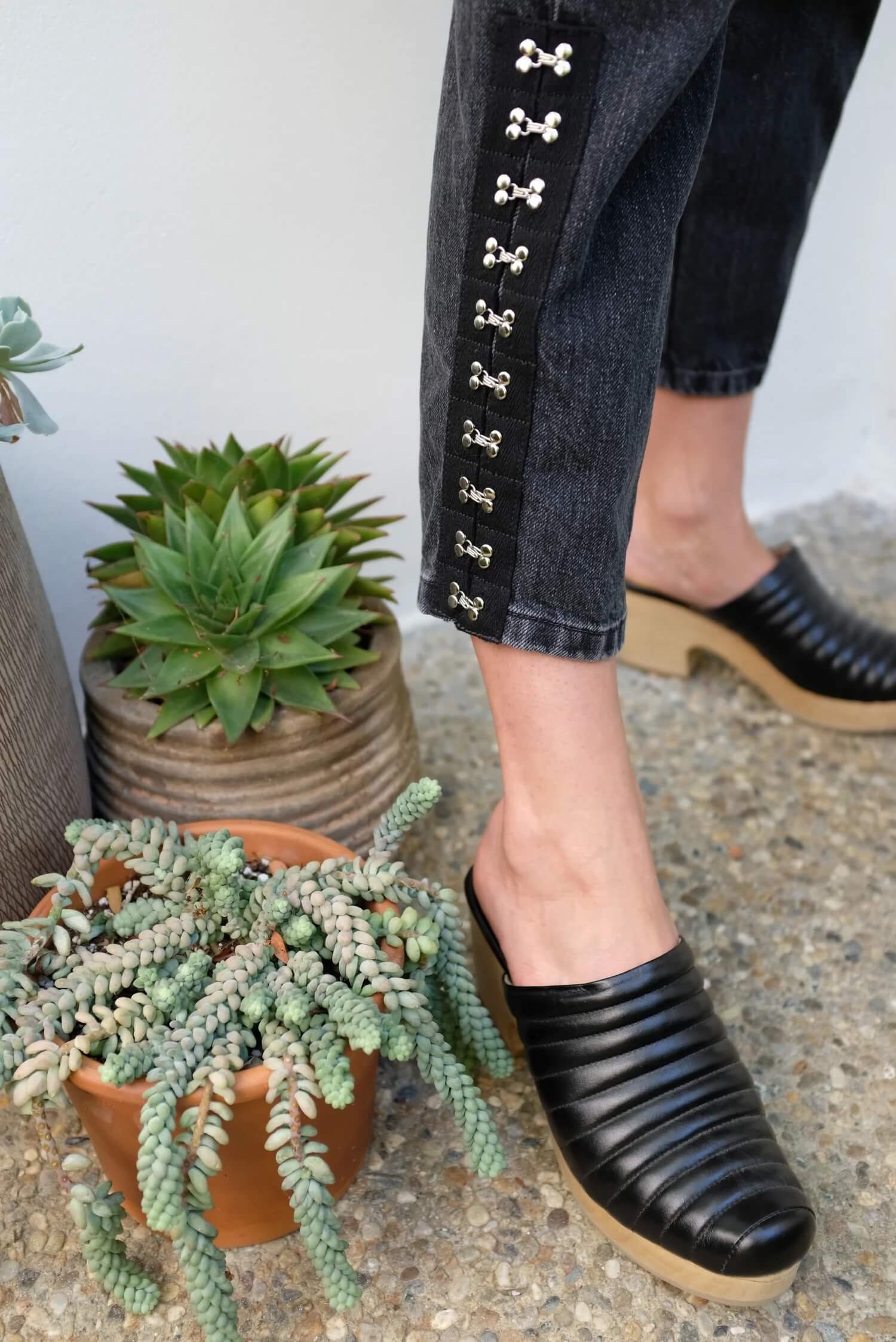 A model in Beklina sustainable clogs.