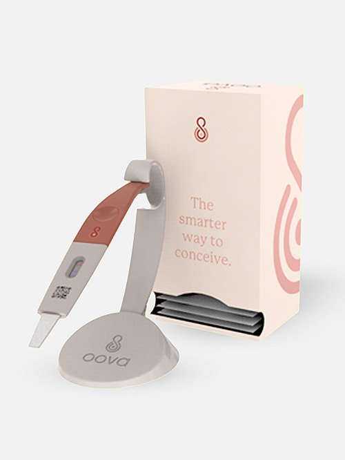 The Best Ovulation Test Strips For Family Planning: The Oova Kit with holder, handle, and 15 urine test strips.