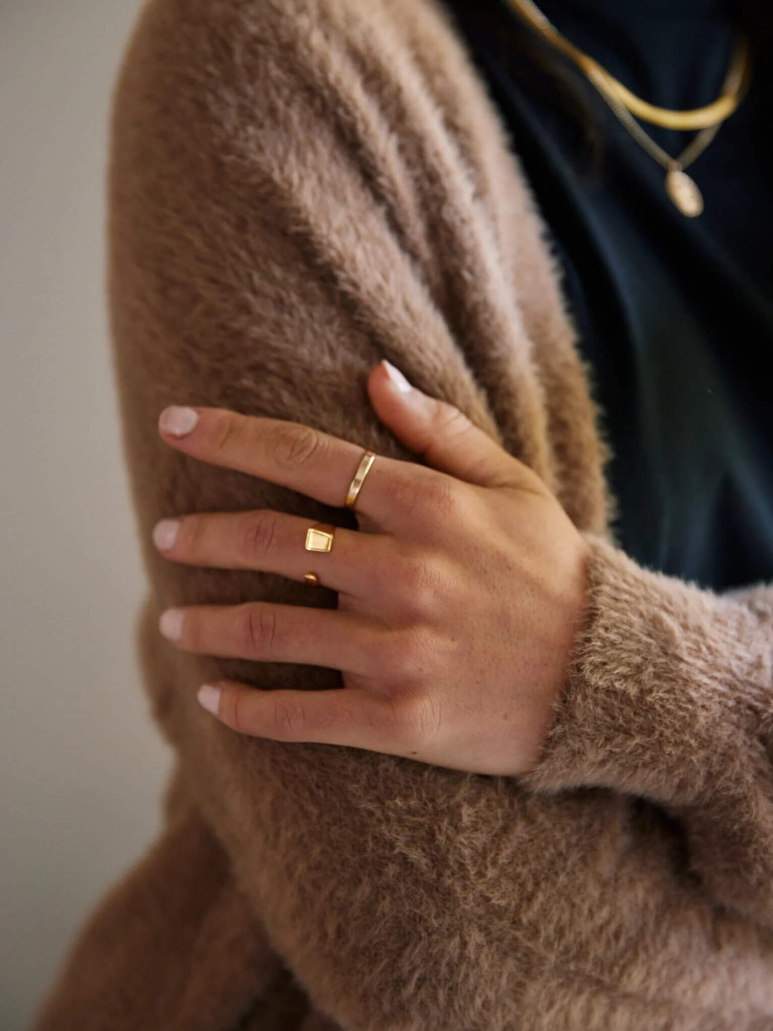 ABLE rings on a model's hand.
