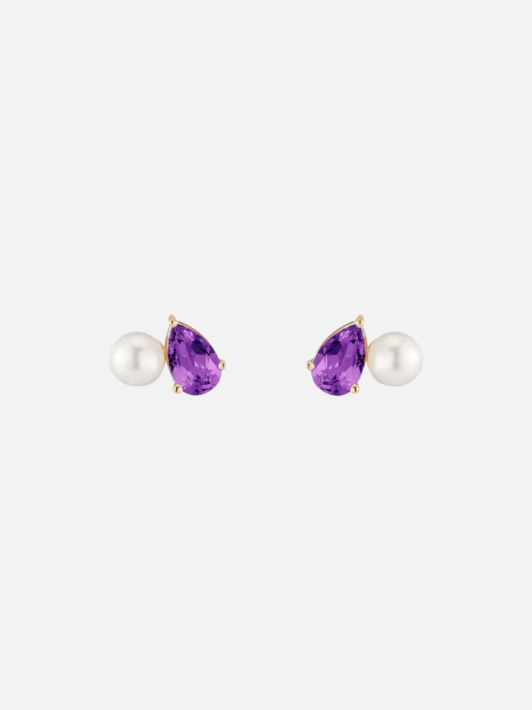 Pair of pearl and purple gemstone earrings on a white background.