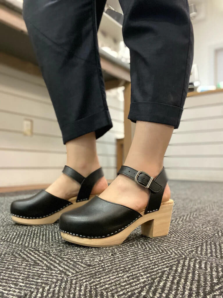 A model in MooShoes sustainable clogs.