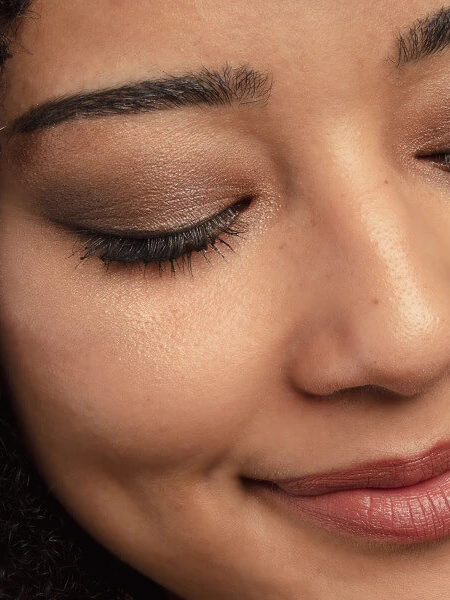 A woman wearing natural eyeshadow.