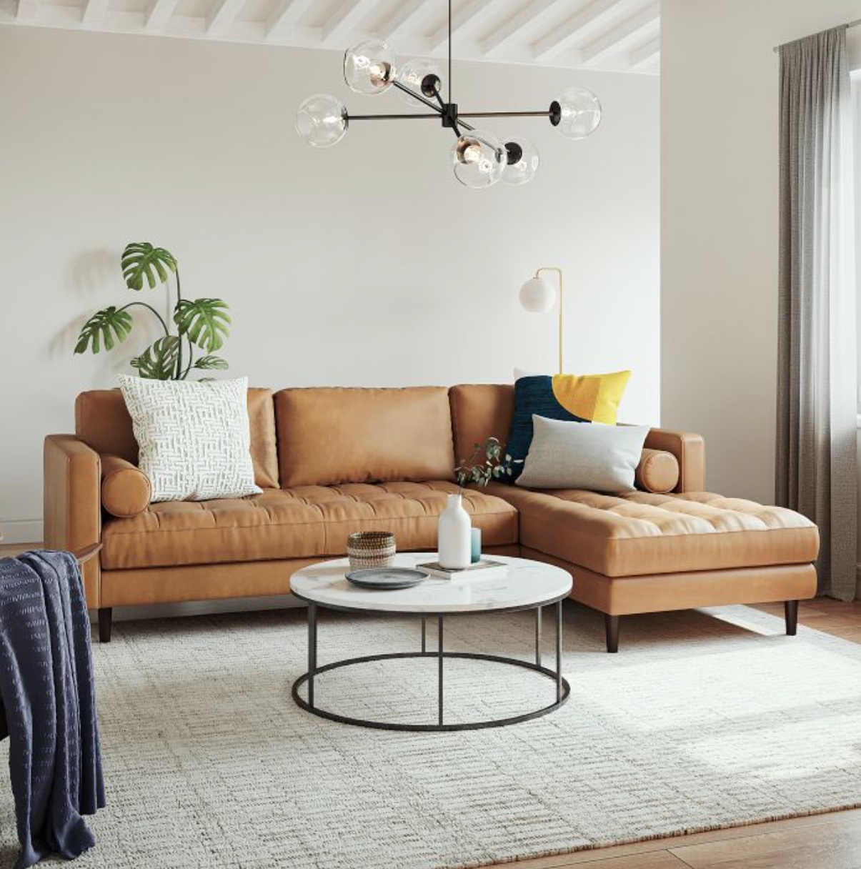 A West Elm Couch in a styled living room. 