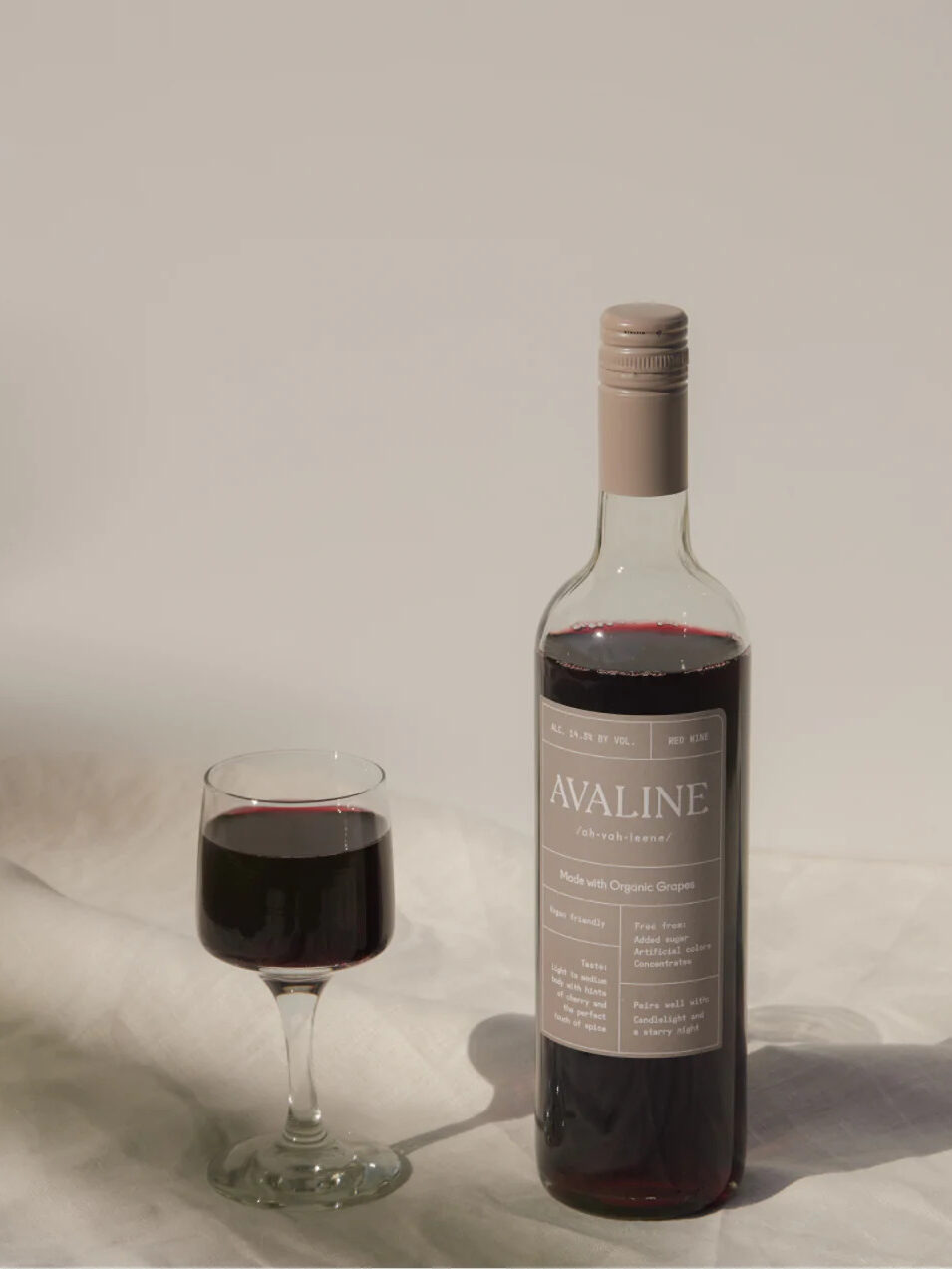 A bottle and glass of Avaline red wine.