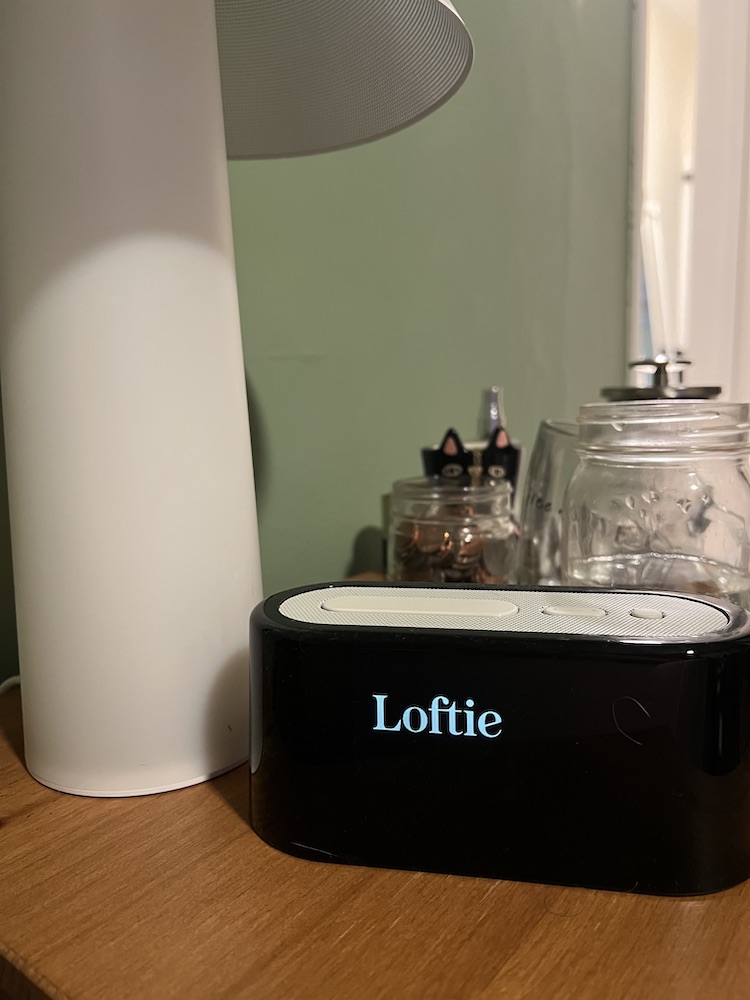 The Loftie alarm clock displaying the Loftie logo