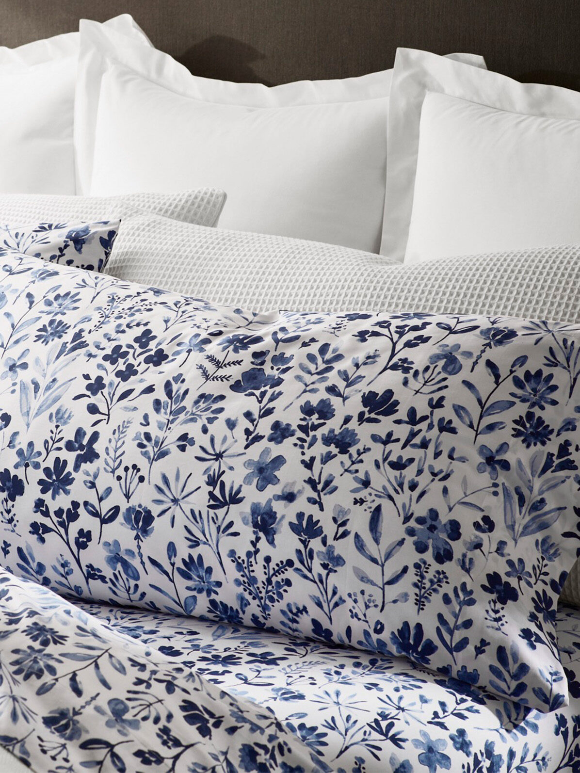 Blue and white floral Boll & Branch sheets set.