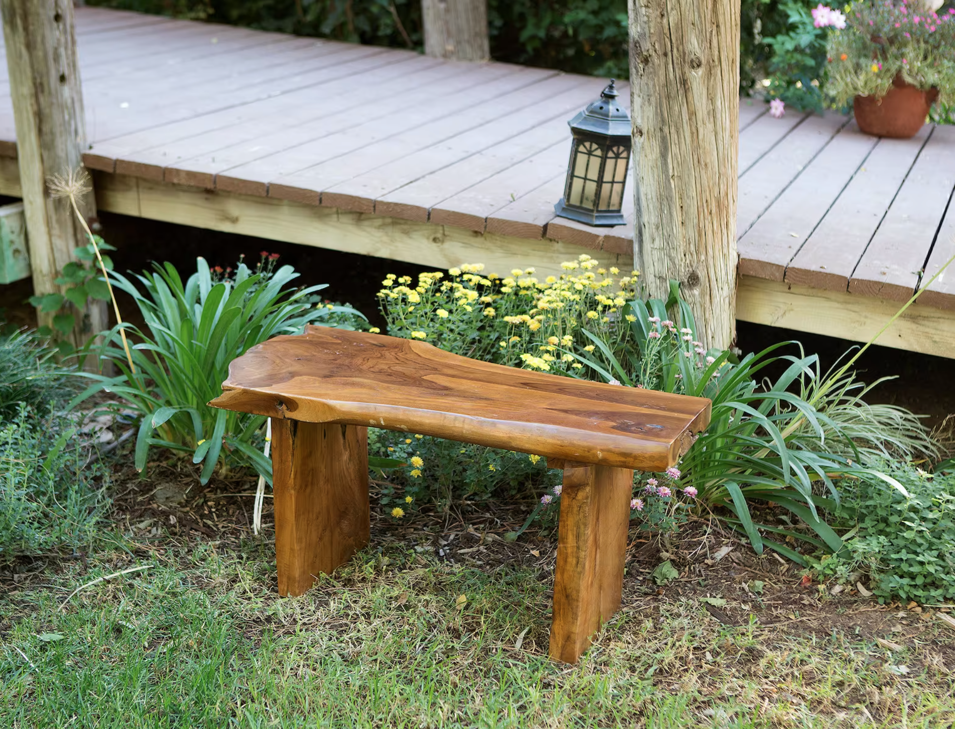 A teak outdoor bench