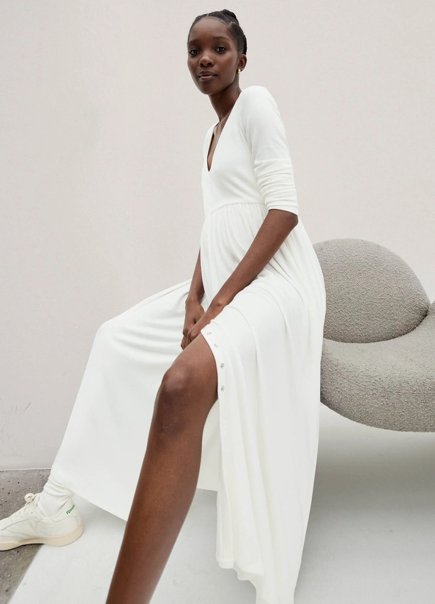 A model in a white dress.