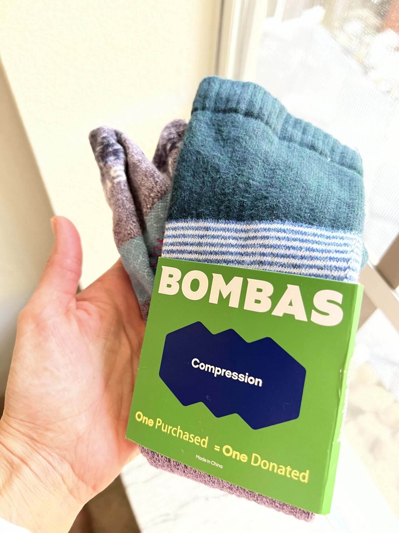The Sustainable Compression Sock That Gives Back (Bombas Review) The Good Trade