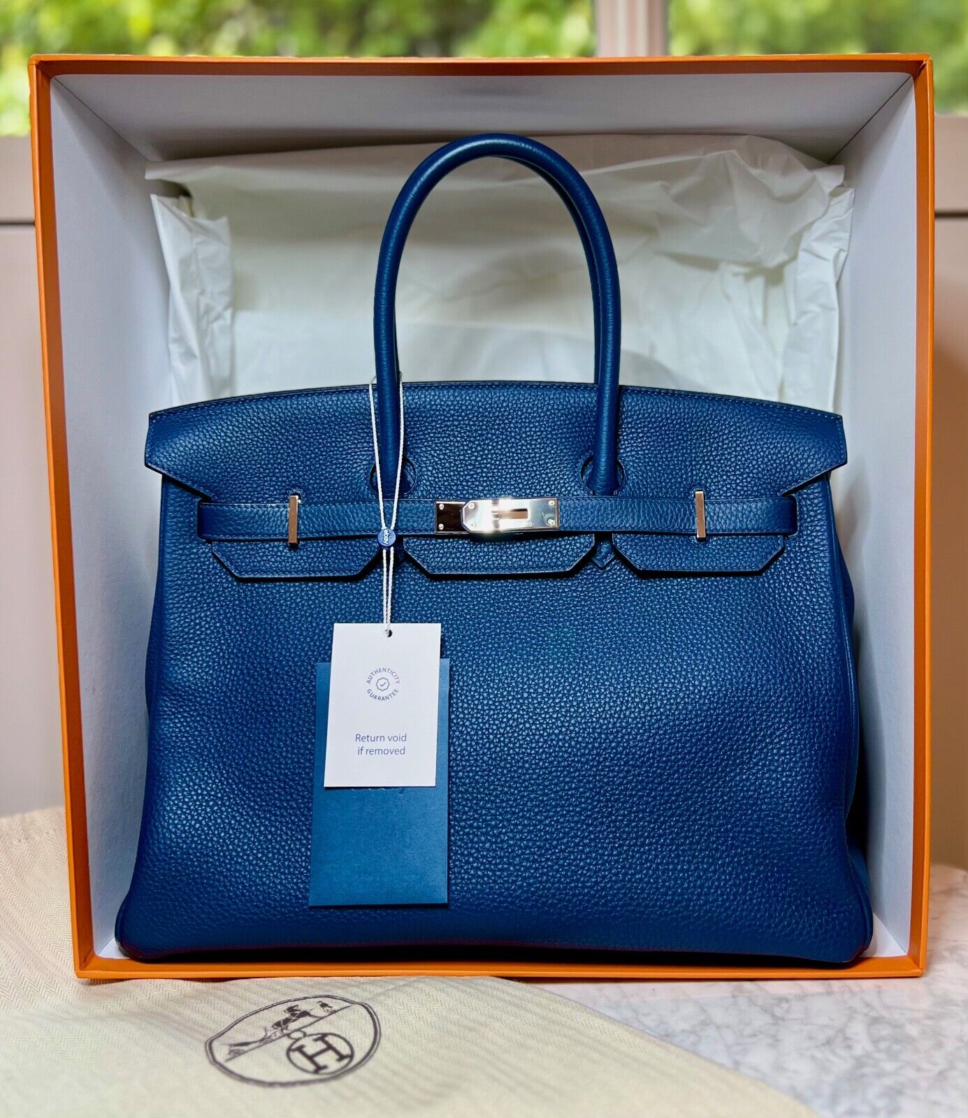 A blue hermes birkin bag