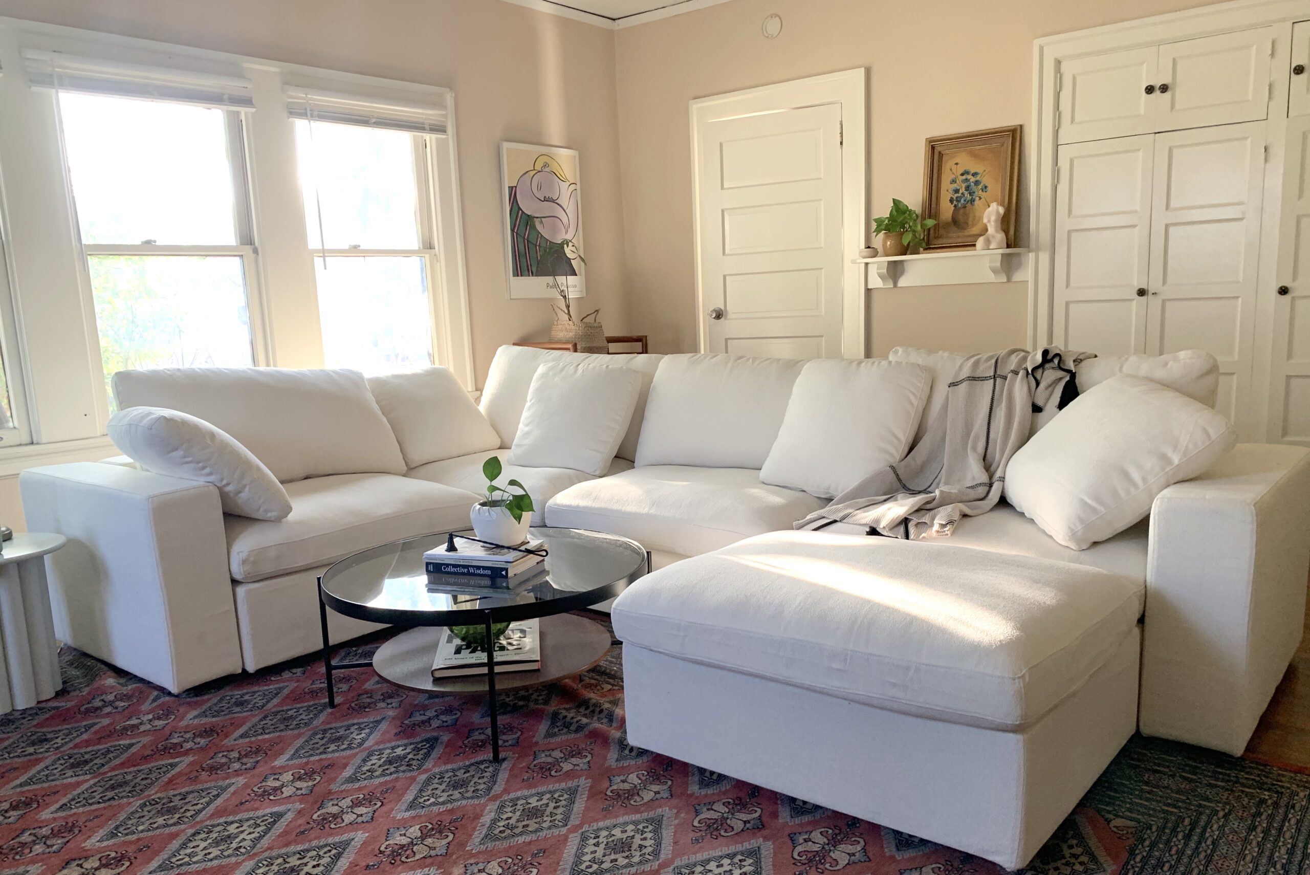 The 7th Avenue 4-seat Modular corner sectional in white, set up in our editor's living room.
