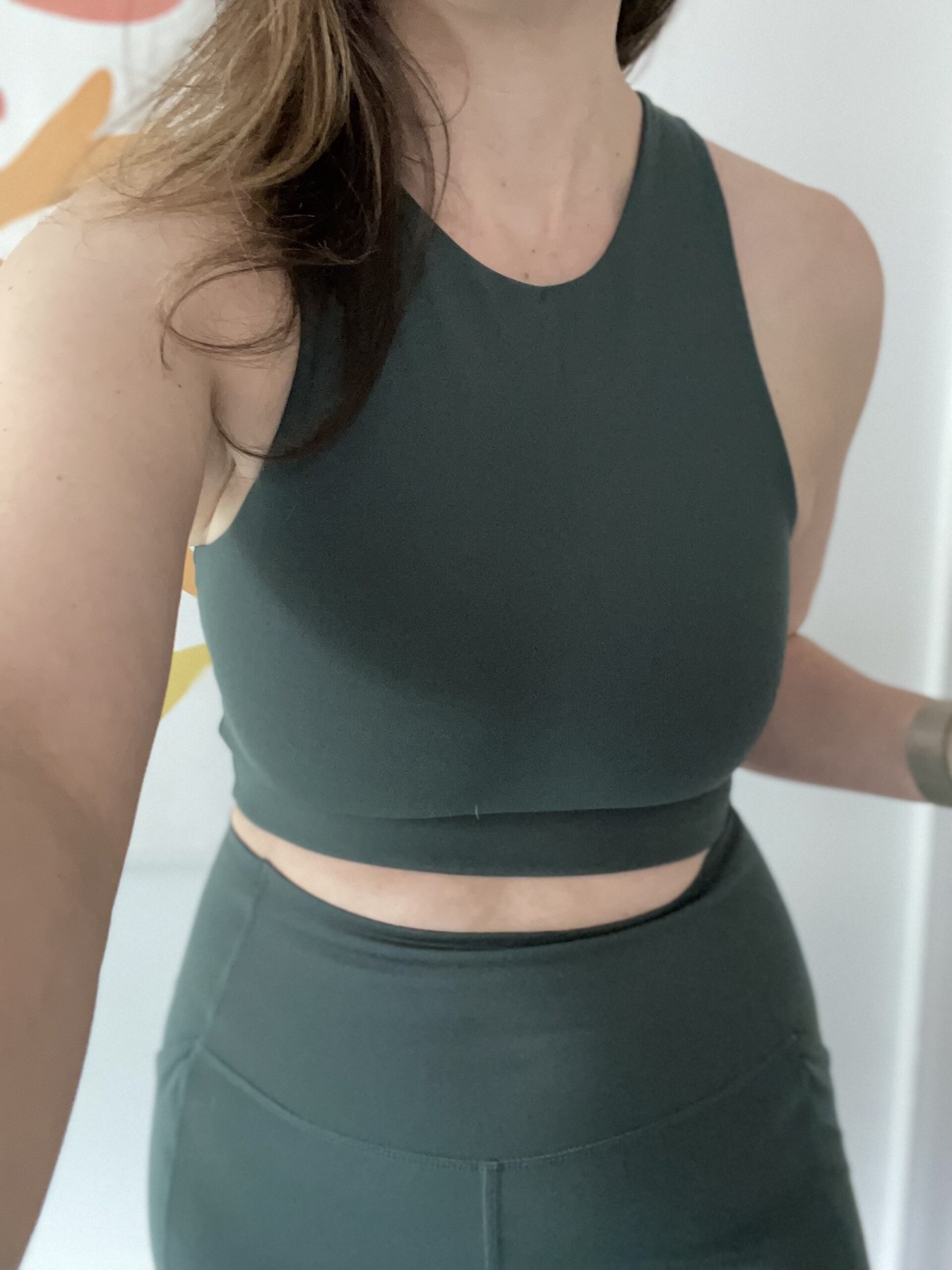 Closeup of the leggings and sports bra while standing.