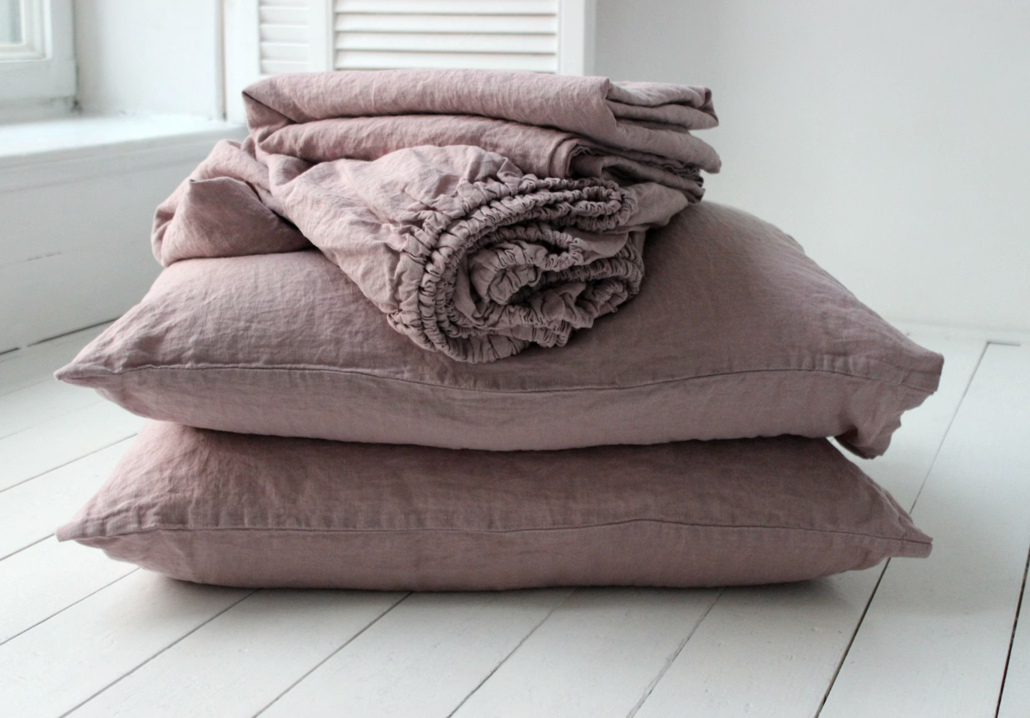 Dusty lavendar fitted sheets. 