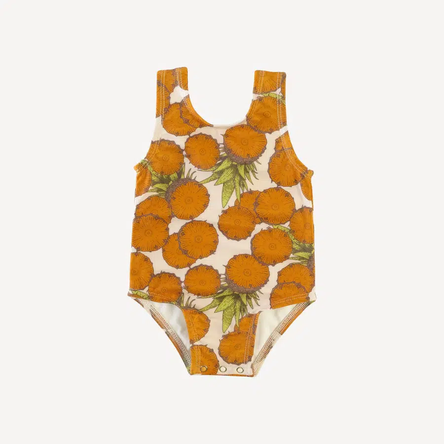 A pineapple print tank onesie from Kate Quinn.