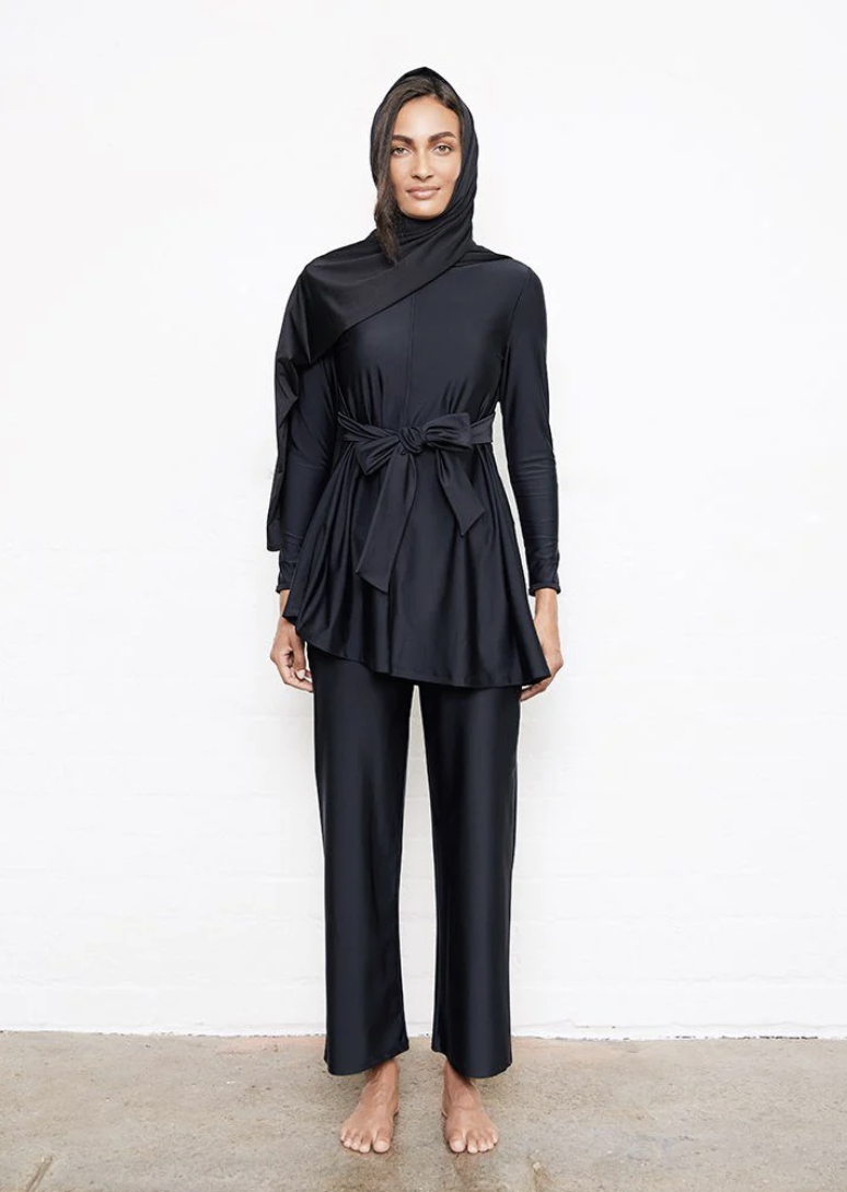 A model in a black burkini.