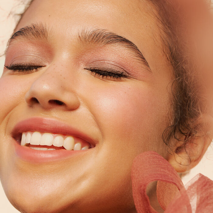 A model wearing Well People eyeshadow.