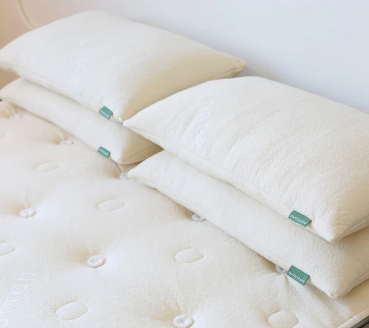 An Avocado mattress and pillows.