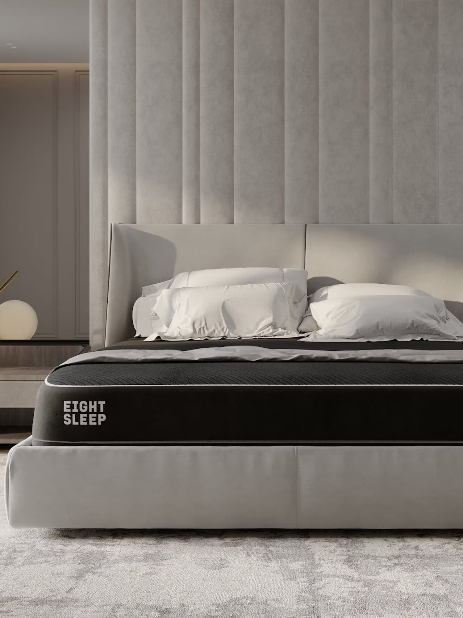 An Eight Sleep pod mattress on a bed.