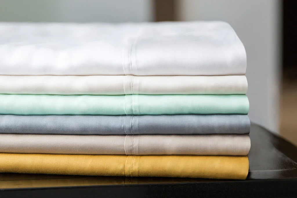 A stack of folded Tencel sheets. 
