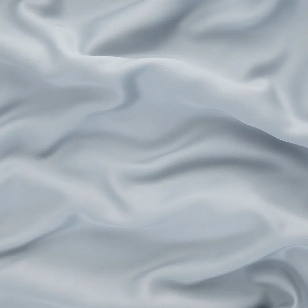 A detail of light blue Tencel sheets. 