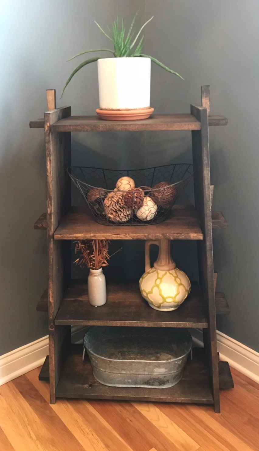 A reclaimed wooden shelf with objects on it. 