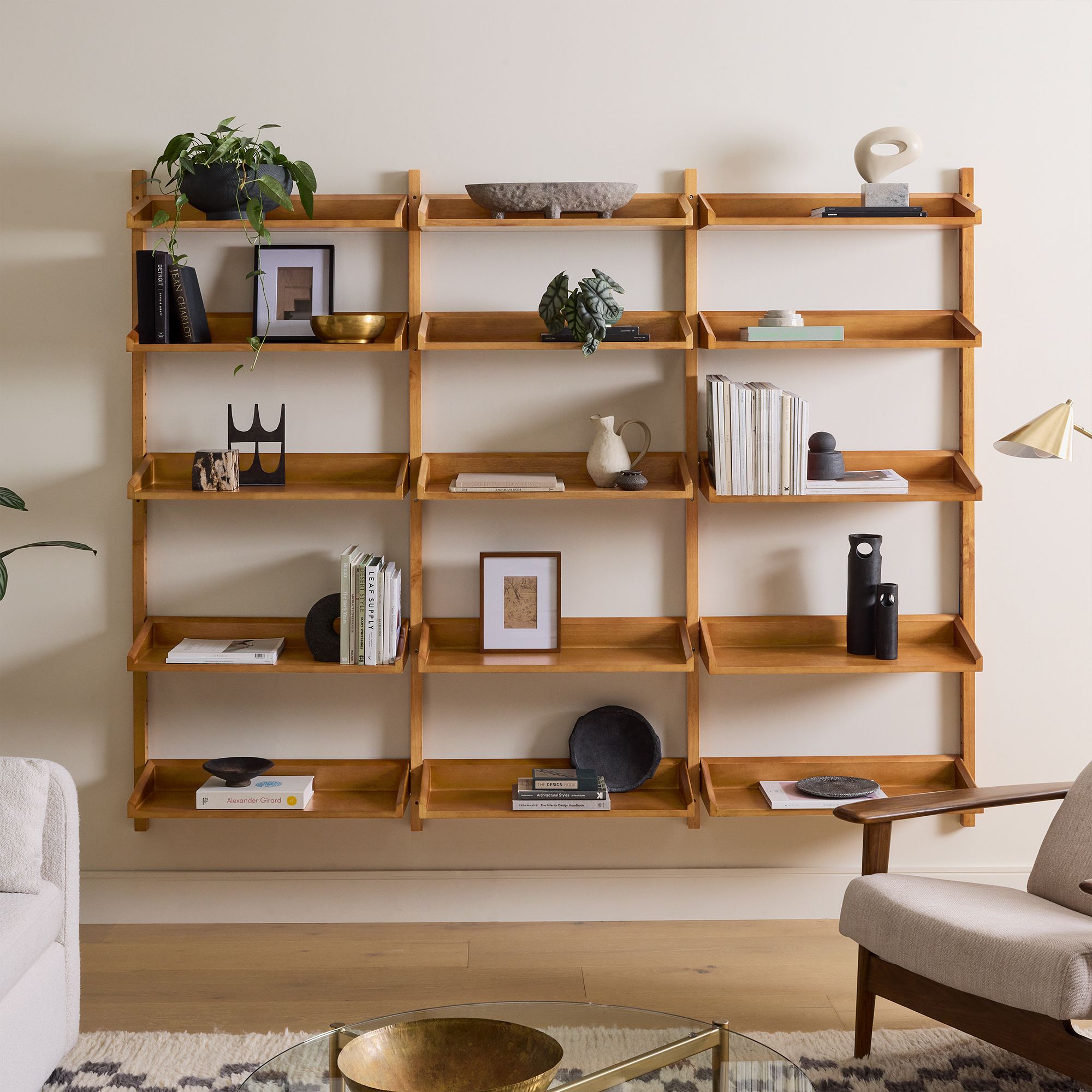 A styled West Elm shelf in a styled living space. 