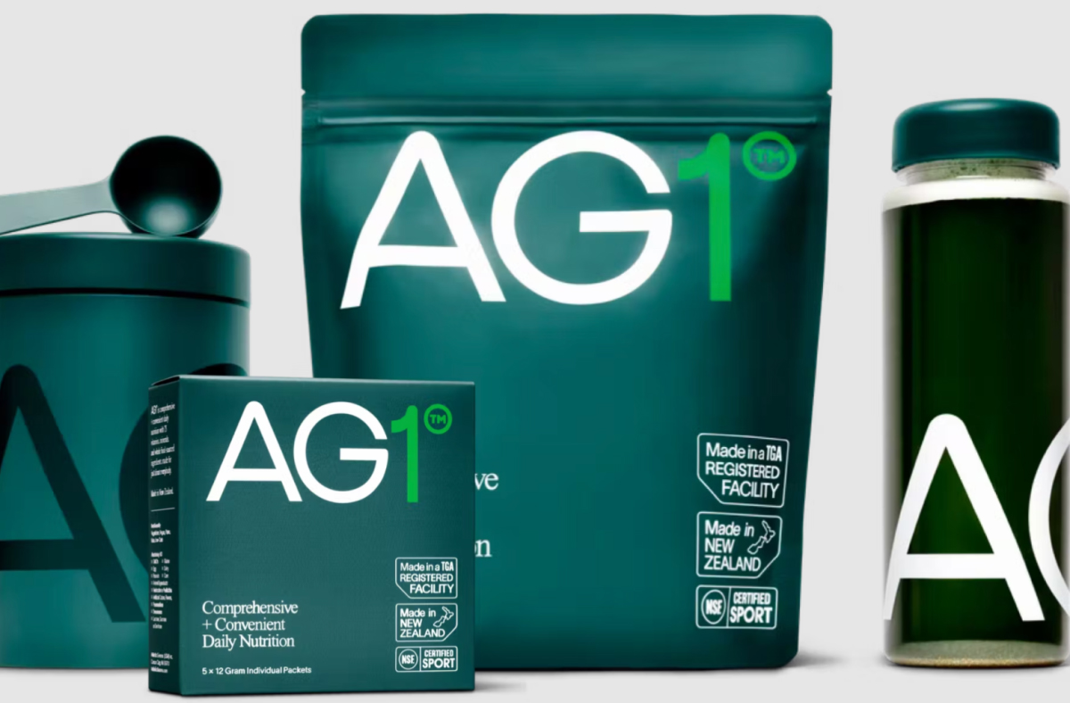 A box and bag of AG1 calcium supplements.