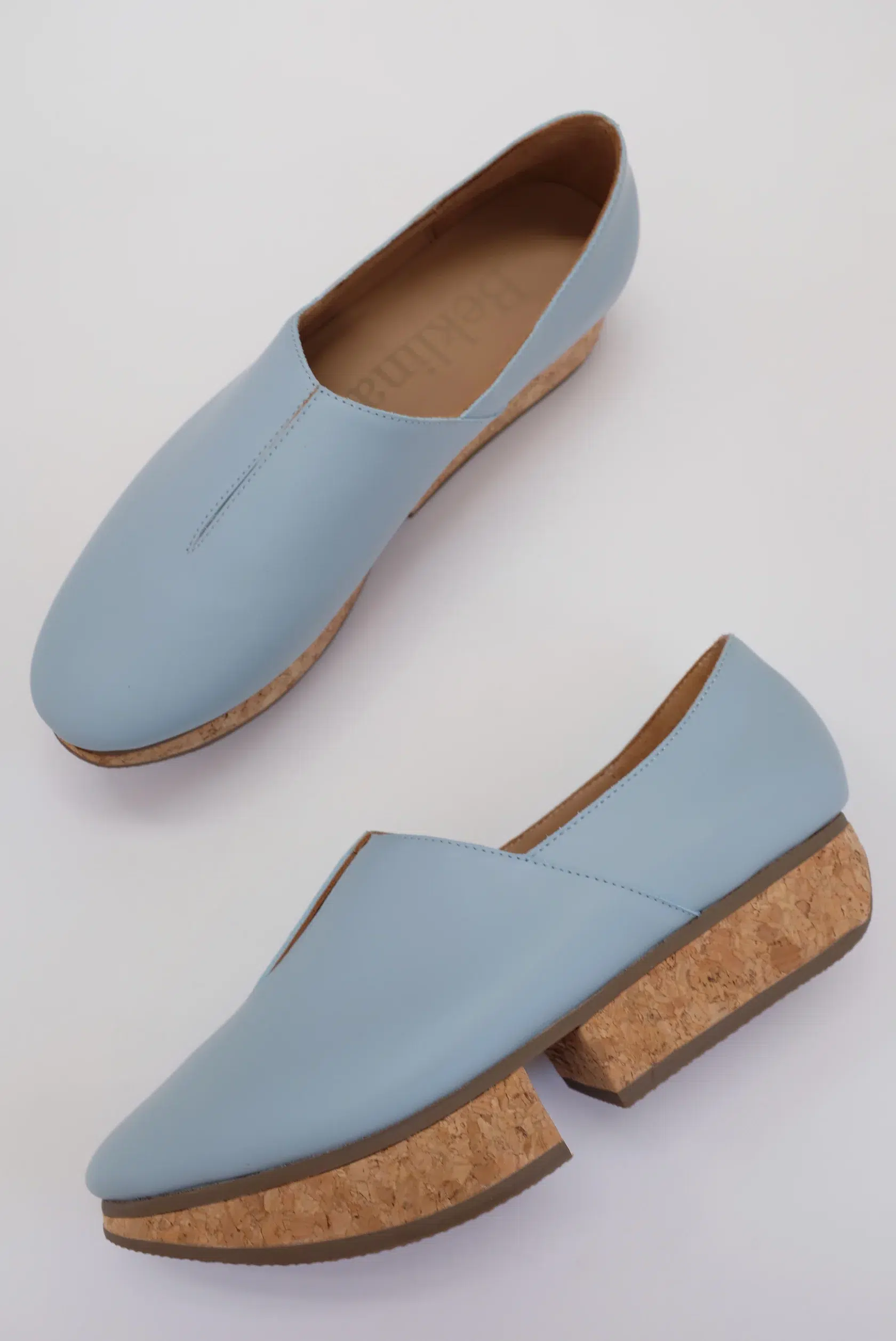 Blue Beklina sustainable loafers.