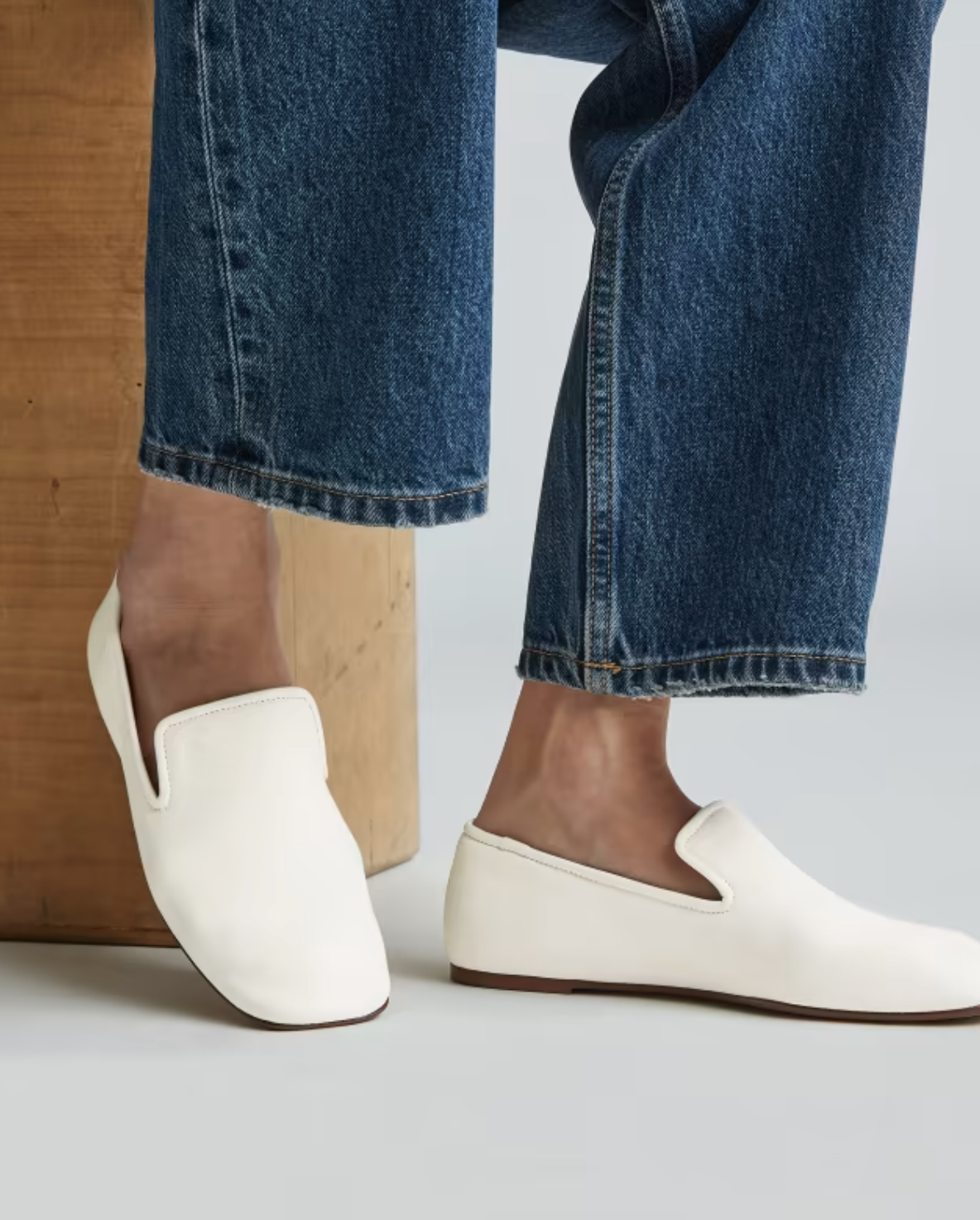 A model wearing Everlane sustainable loafers.