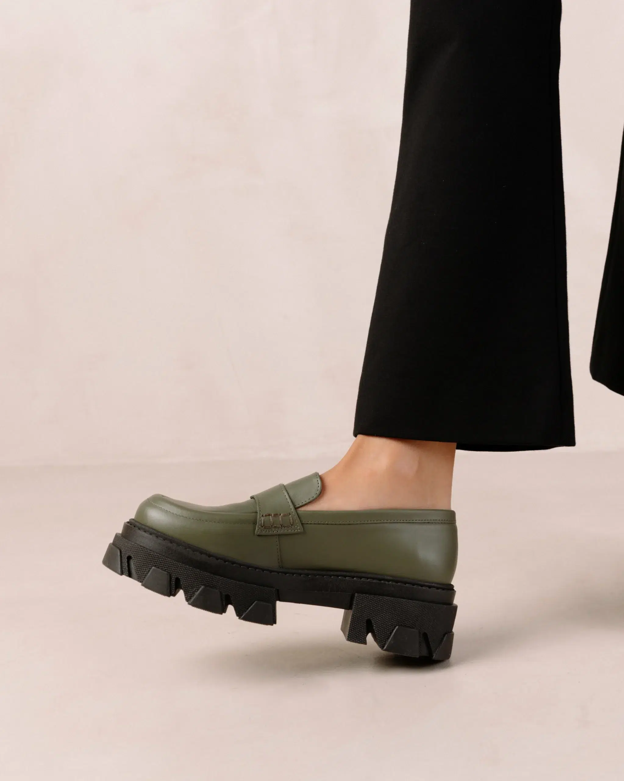 A model wearing ALOHAS sustainable loafers. 