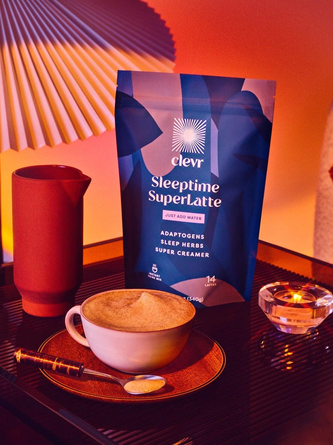 A pack of Clevr Sleeptime Coffee Alternative with a brewed cup of the same blend in front of it.