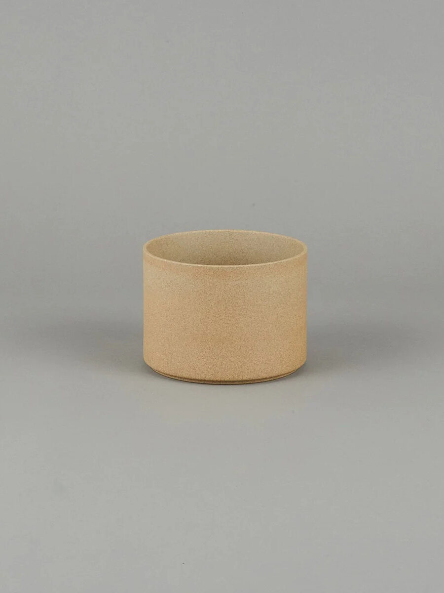 White Hasami Porcelain Plant pot with a grey background behind it.