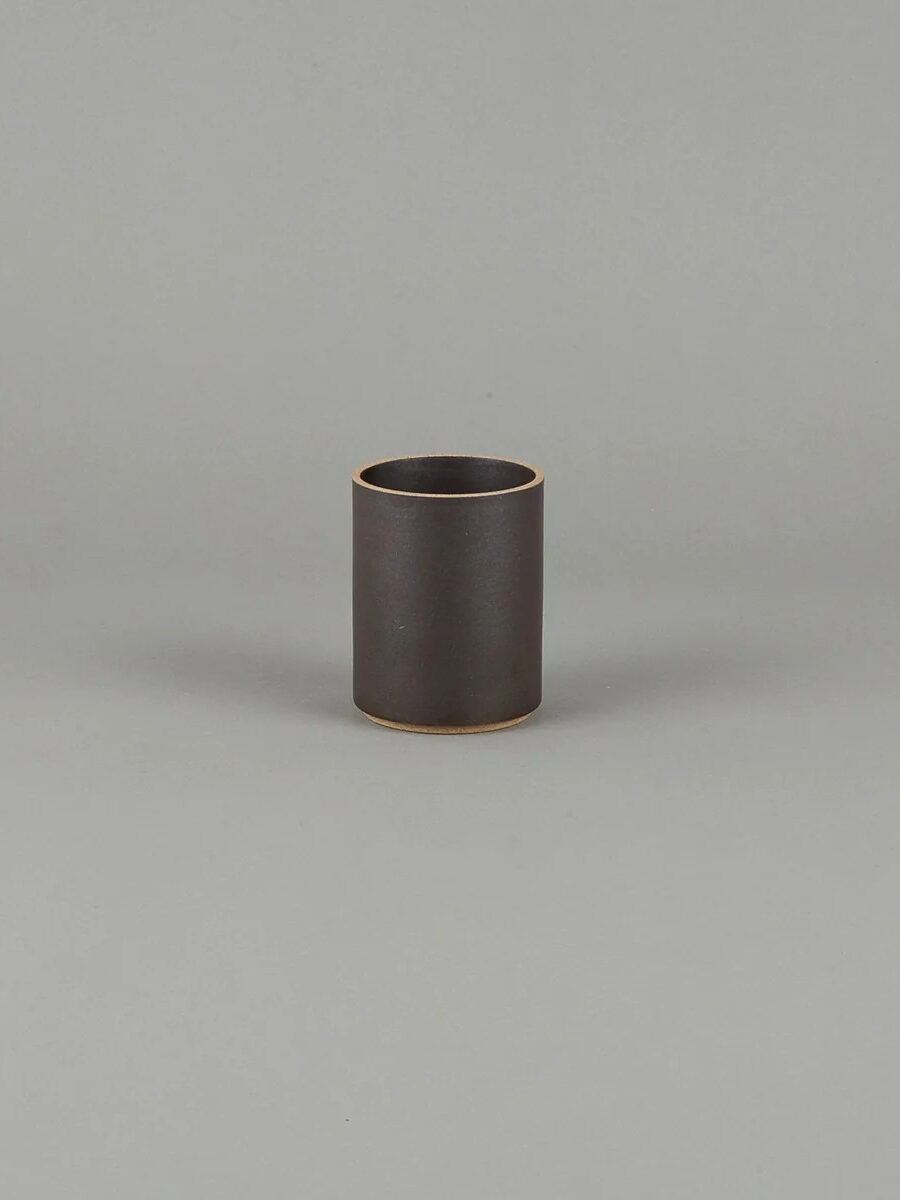 Black Hasami Porcelain Plant pot with a grey background behind it.