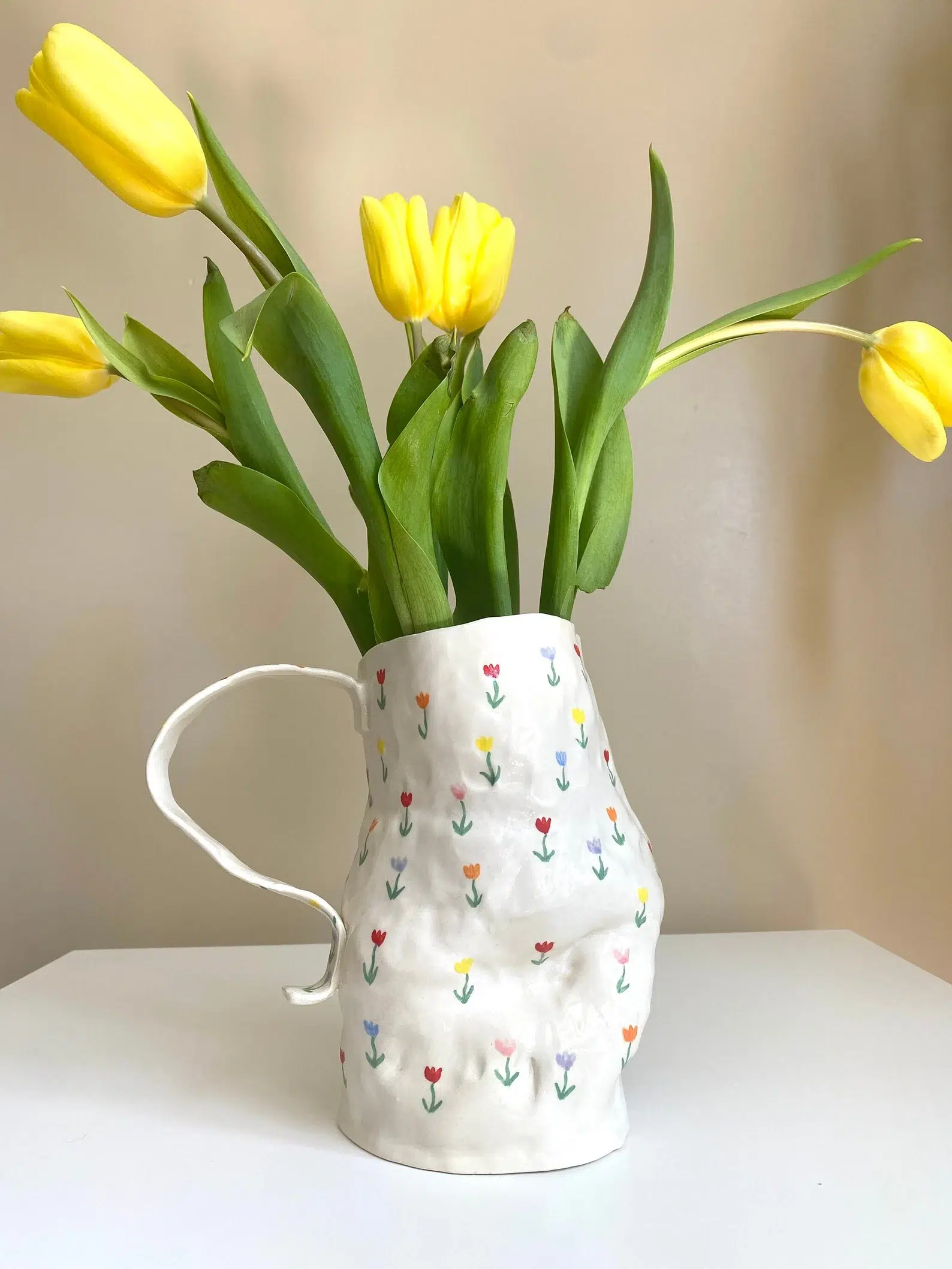 A handmade painted ceramic vase from La Fleur Artisane