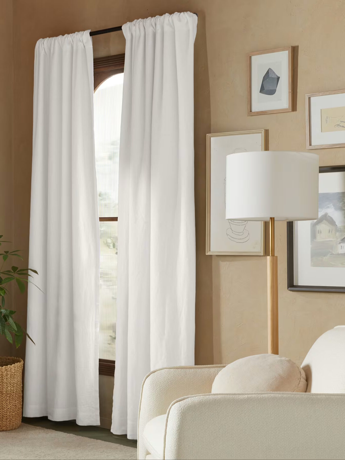 White Parachute curtains styled in a bedroom.