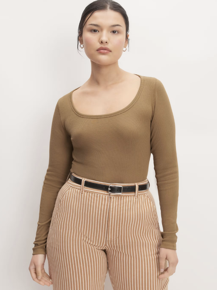A model in a long sleeve tee from Everlane