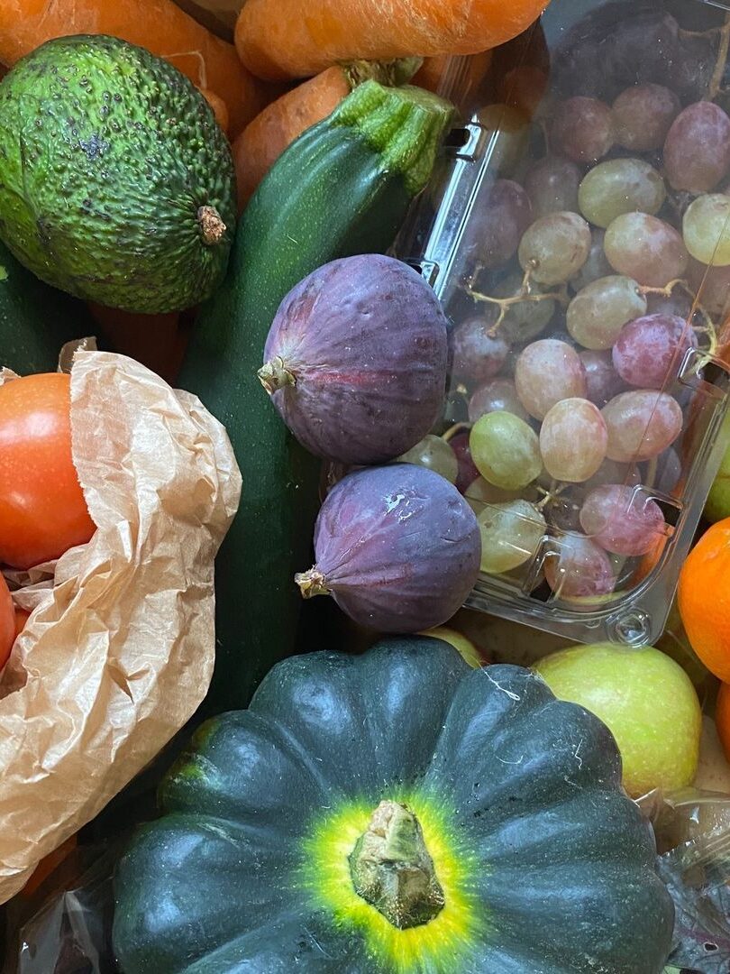 Assorted fruits and vegetables that would be inside an oddbox subscription box.