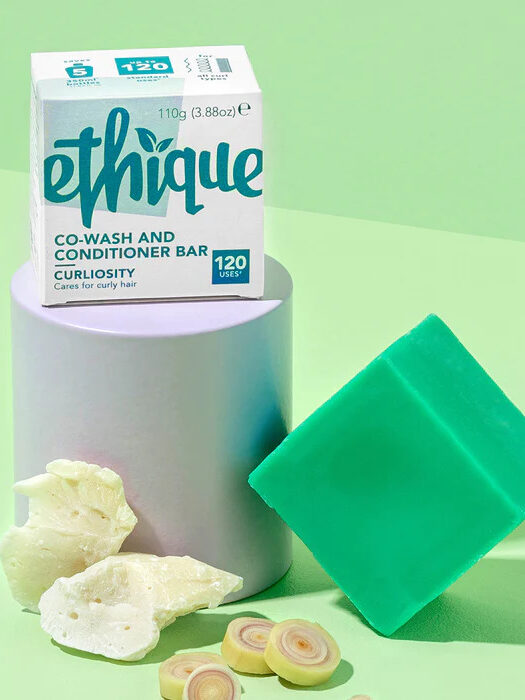 Display of Ethique's conditioner bar, packaging and cocoa butter chunks.