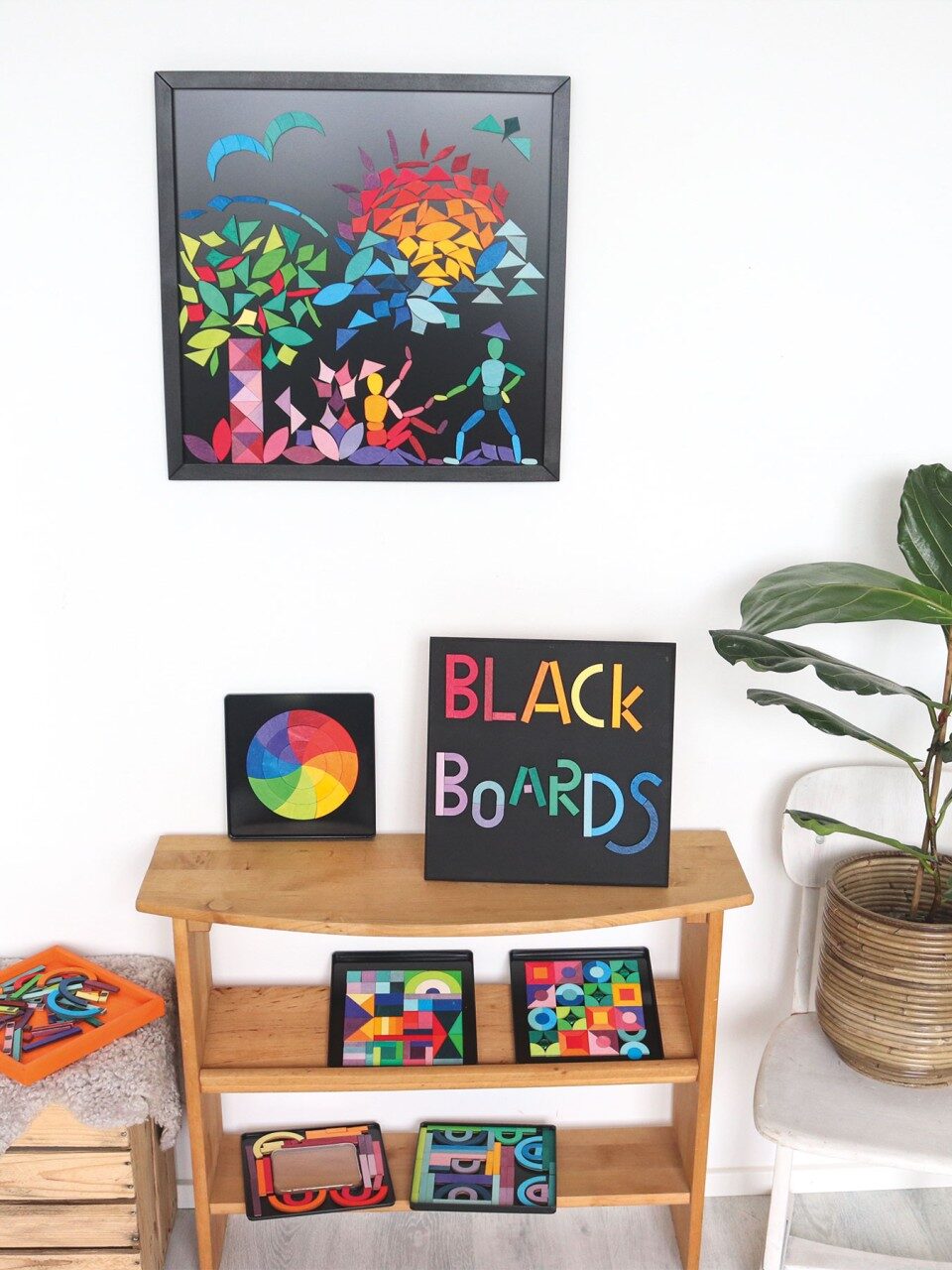 Grimm's Montessori Black Board Toy set up in a playroom.