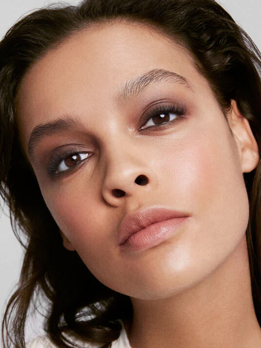 A model wearing Kjaer Weis eyeshadow.