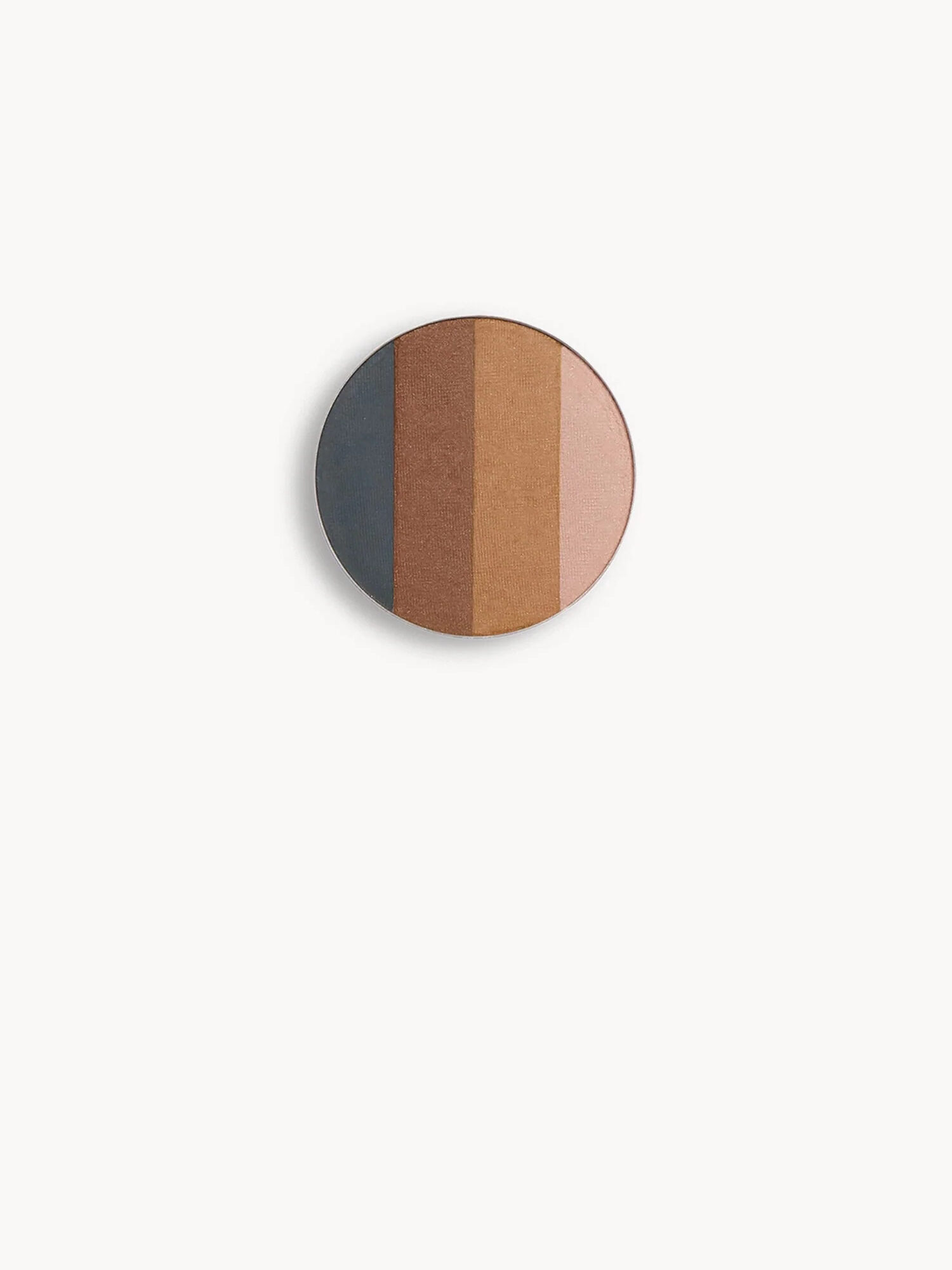 A Kjaer Weis eyeshadow refill.