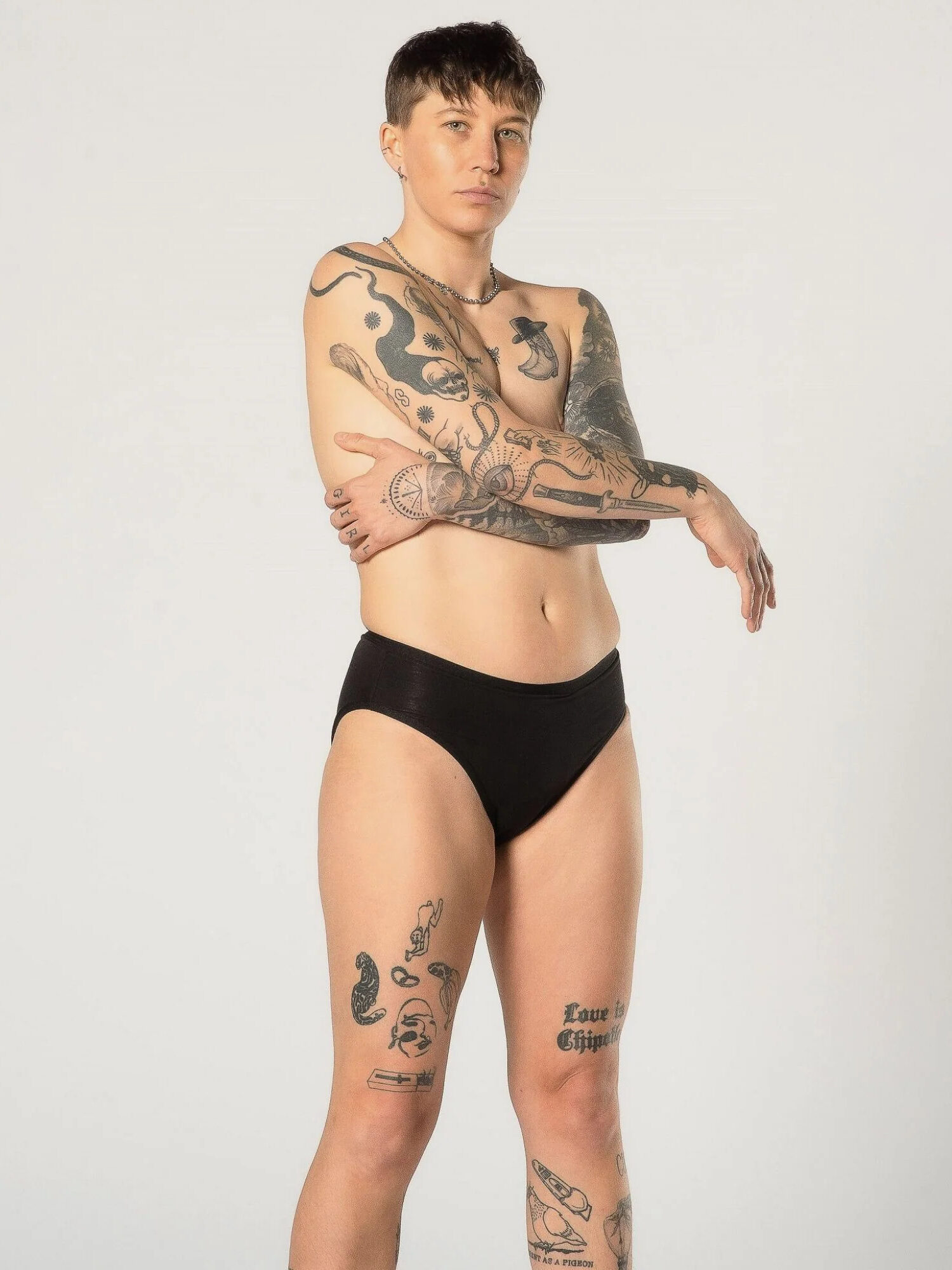 A model wearing Revol Cares period underwear in black.