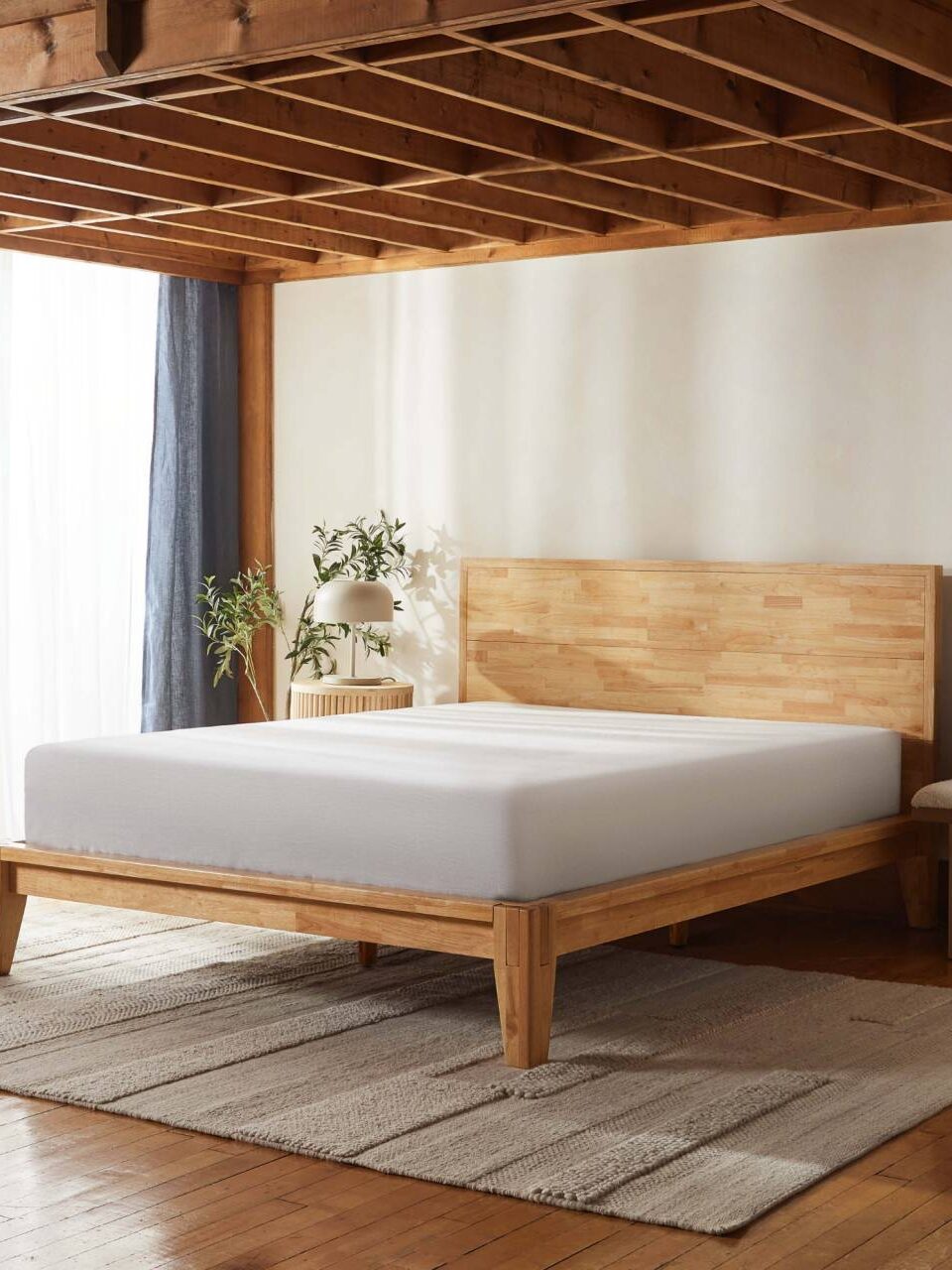 A Silk and Snow wooden bed frame.