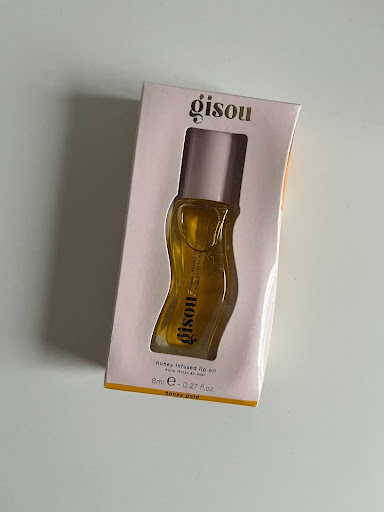 The Gisou lip oil in its package. 