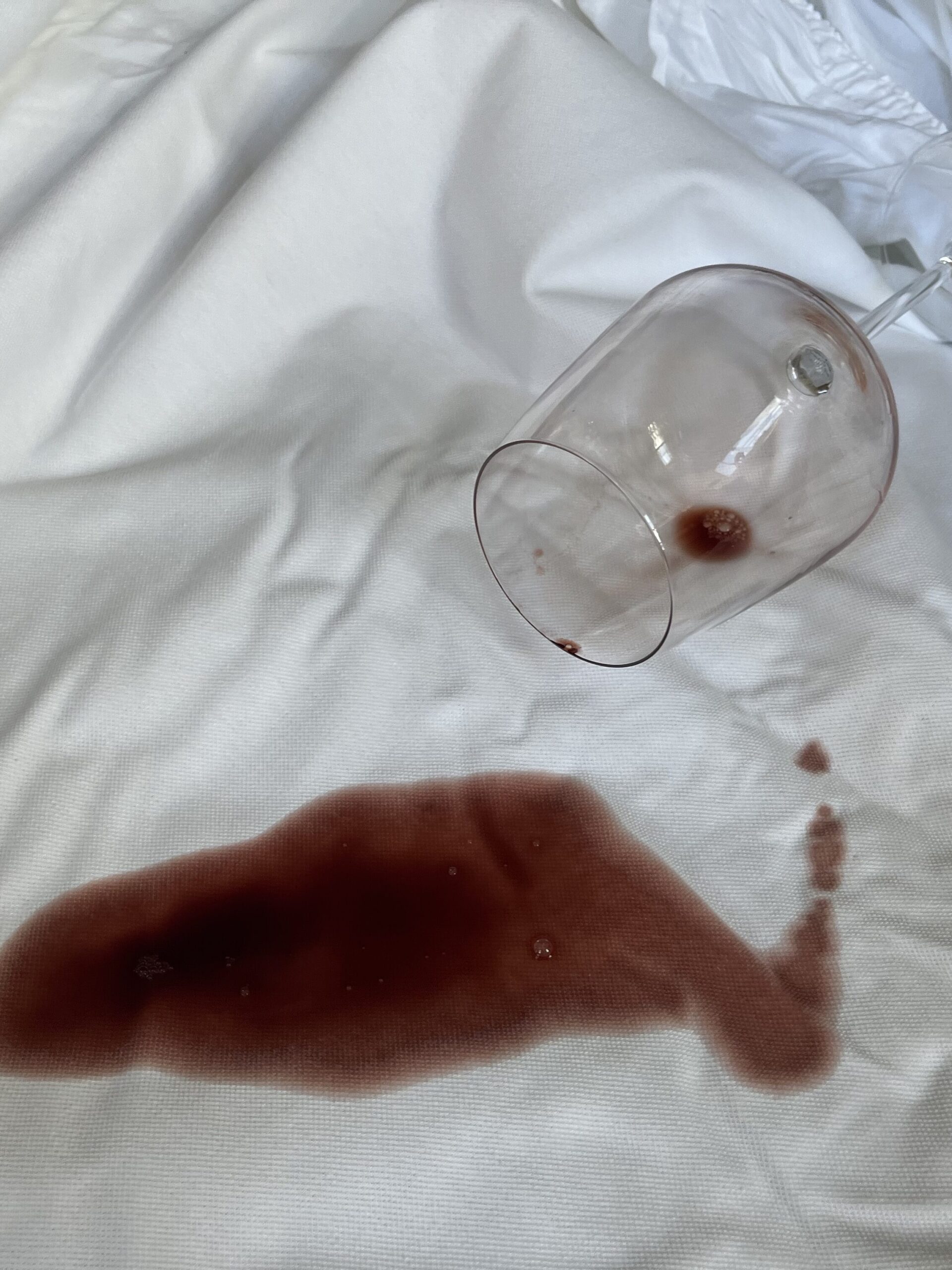 A wine spill on the mattress protector from Saatva