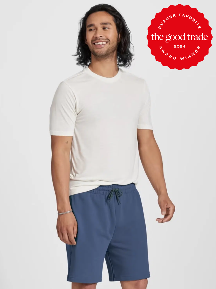A model wearing Allbirds men's sustainable fashion. The TGT 2024 Award Winner Badge is on the right corner of the image. 