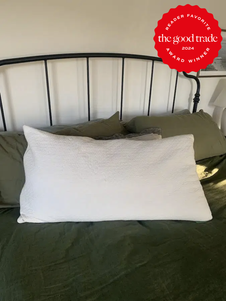 An Avocado organic pillow on a bed. The TGT 2024 Award Winner Badge is on the right corner of the image.